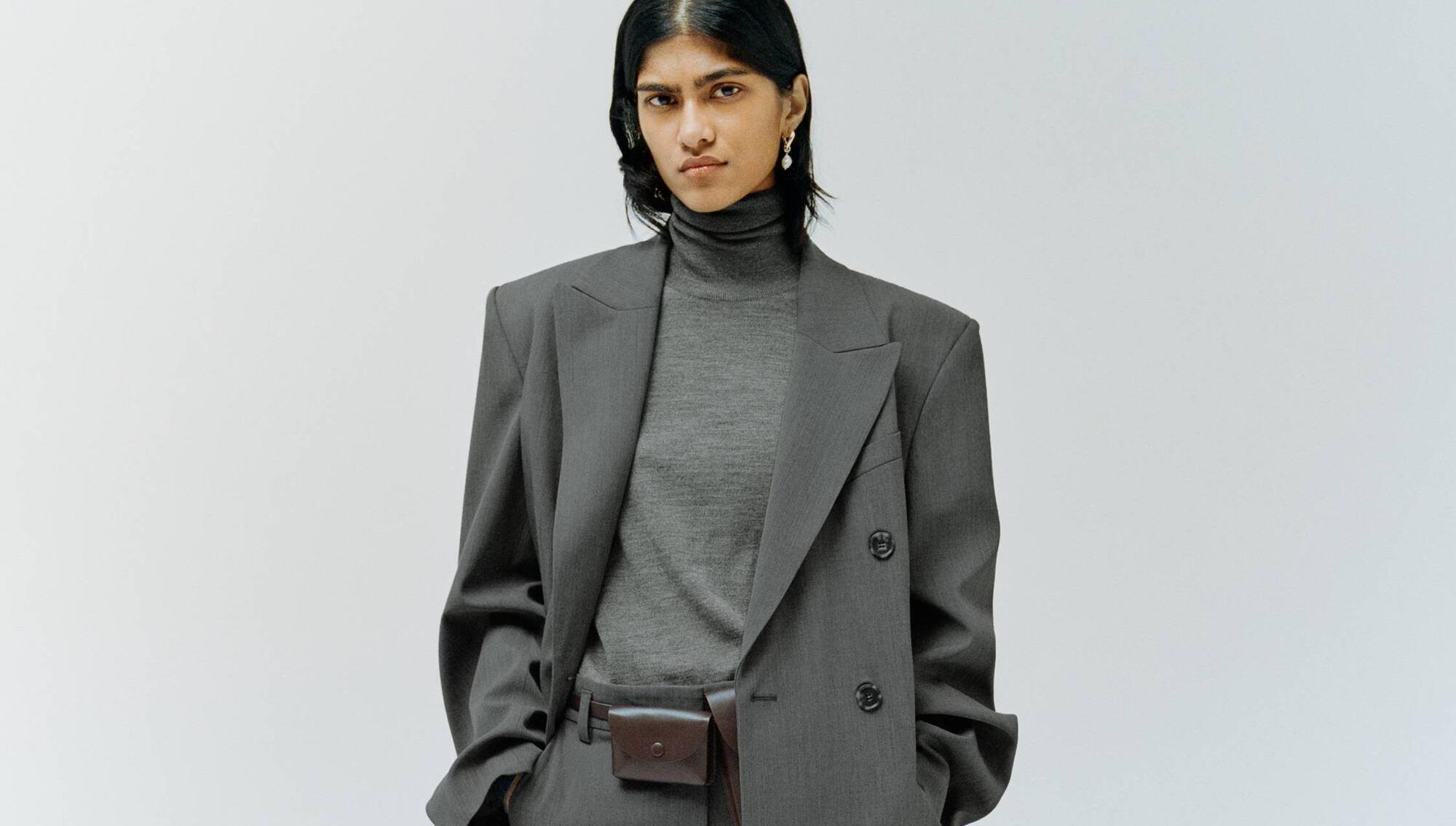 Oversized double-breasted coat, €279; roll-neck wool top, €49; tailored wool-blend trousers, €119, Arket