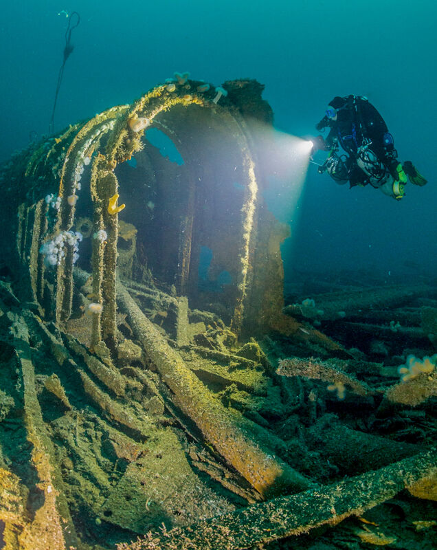  Deep sea diver Yvonne Lynch inspects the remains of the fireman’s tunnel, behind the bridge of the HMTS Justicia. The tunnel was near the bottom of the ship and used only by the stokers of the coal-fired steam boilers to get to and from their living quarters without being seen by any passengers. Picture: Stewart Andrews.