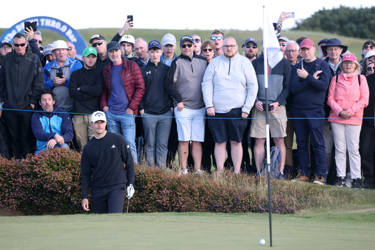 Denmark's Rasmus Hojgaard chips in on 17.