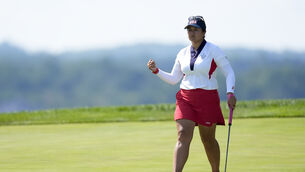 <p>USA WINS: Lilia Vu reacts after making a vital putt on the 17th green before clinching the Solheim Cup for the United States. Picture: Chris Szagola/AP</p>