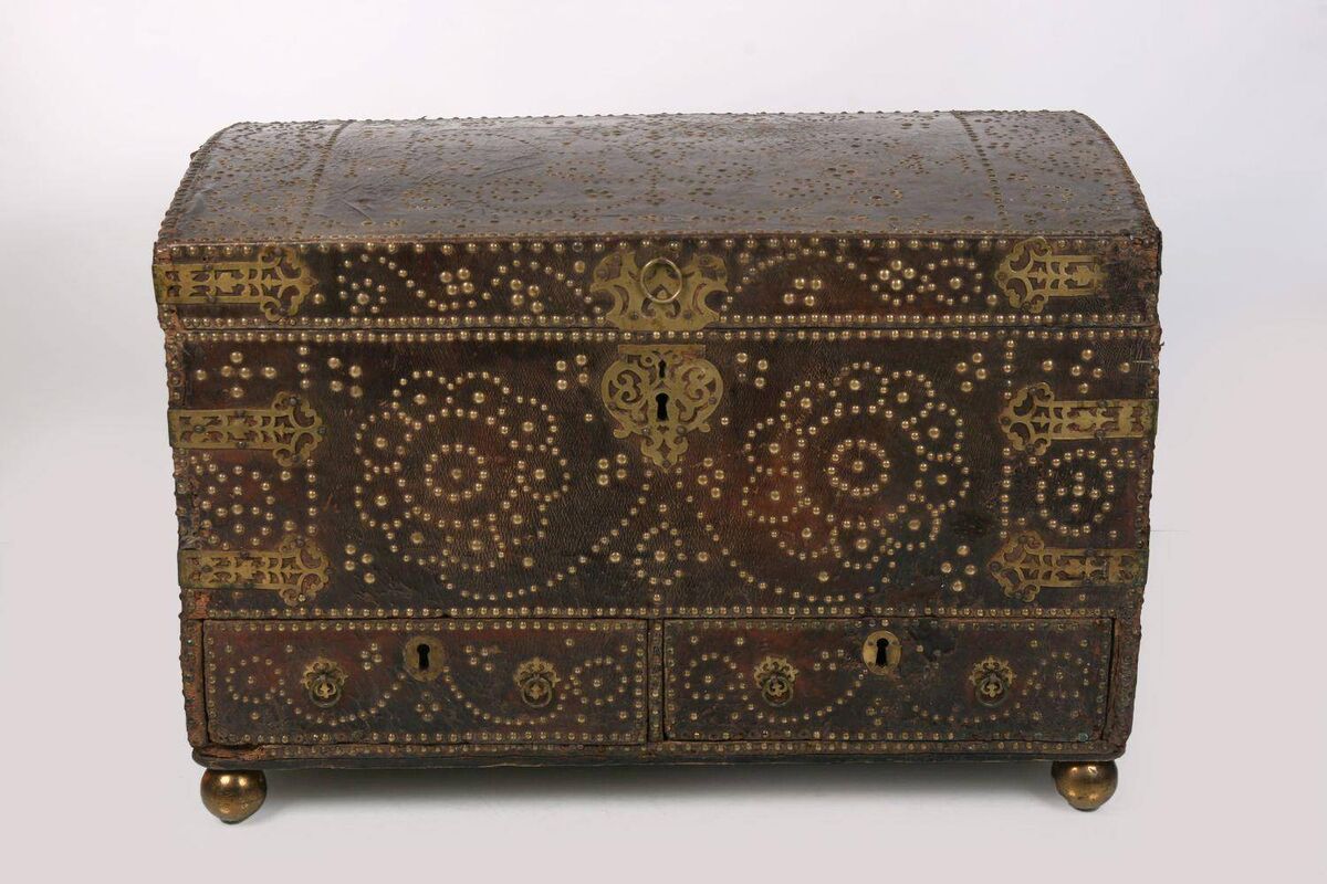 An Irish 17th-century leather-bound marriage trunk. An Irish 17th-century leather-bound marriage trunk.