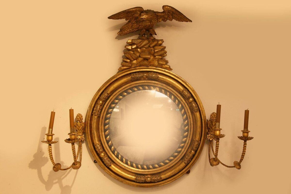 A Cork Regency carved giltwood mirror. A Cork Regency carved giltwood mirror.