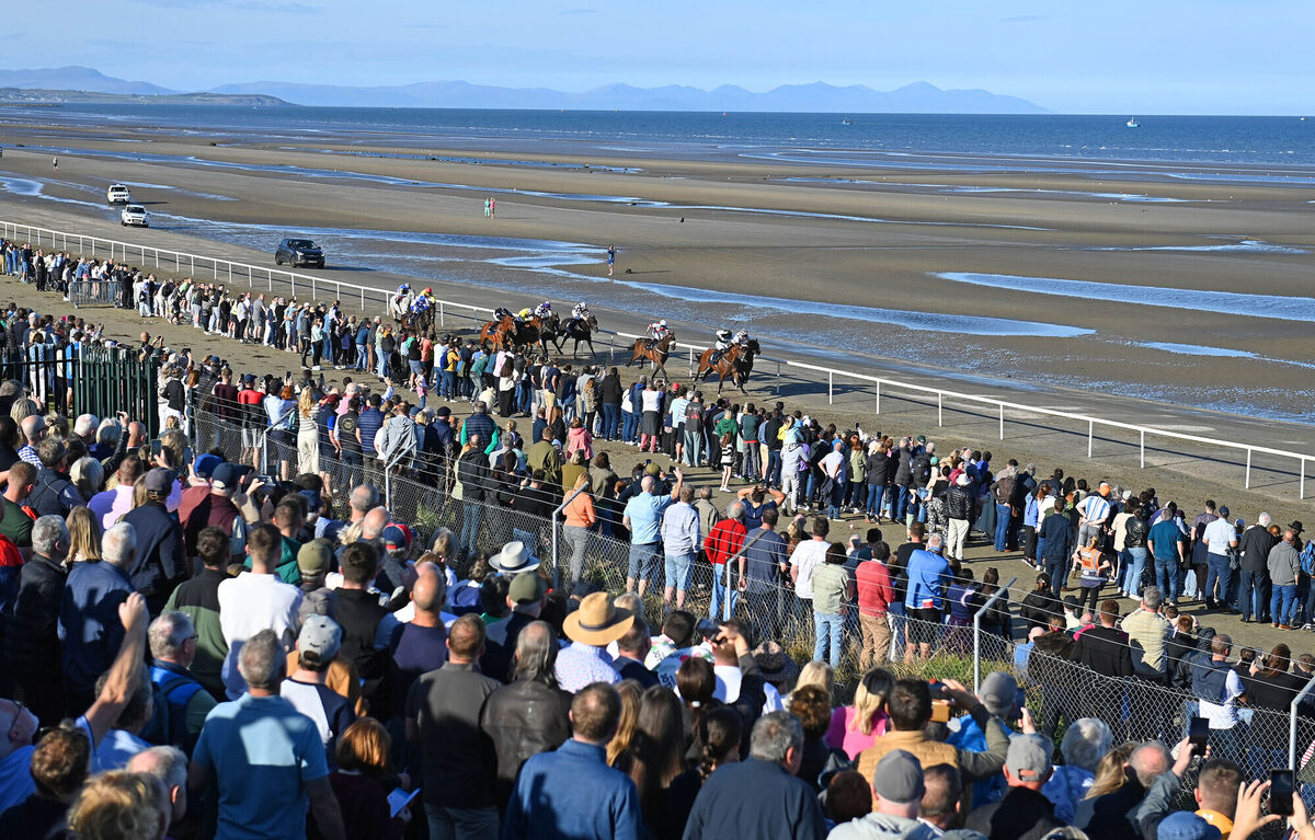 Runners and riders racing up to the finish line with Cherry Pink winning. Picture: Healy Racing