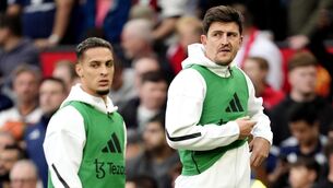 <p>Manchester United's substitutes Harry Maguire (right) and Antony during the Premier League against Liverpool at Old Trafford. Picture: Nick Potts/PA Wire.</p>