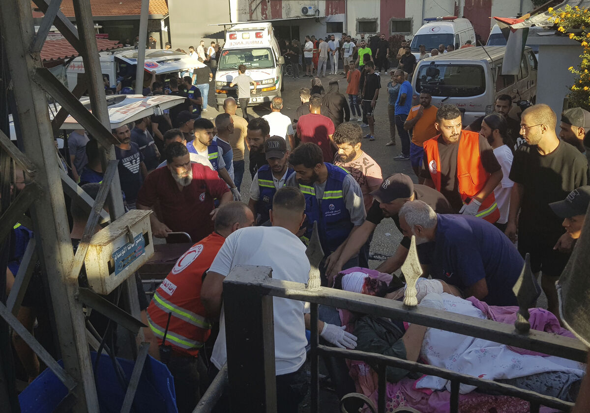 Civil Defense first-responders carry a man who was wounded after his handheld pager exploded, in the southern port city of Sidon, Lebanon, Tuesday, September 17, 2024.