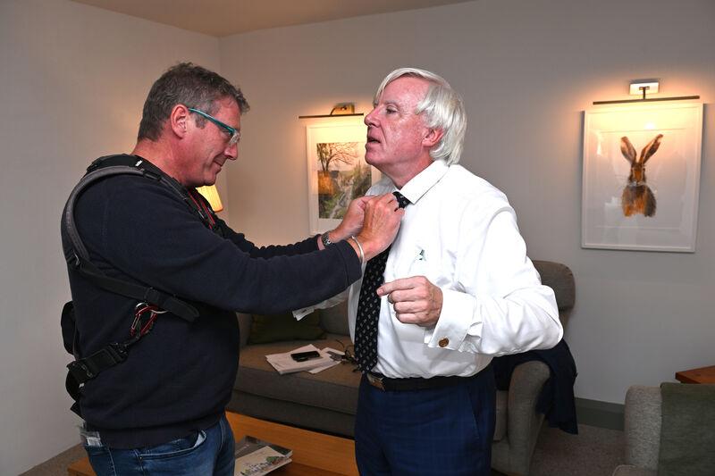 Sound man Finny putting a mic on Francis Brennan. Picture Dan Linehan