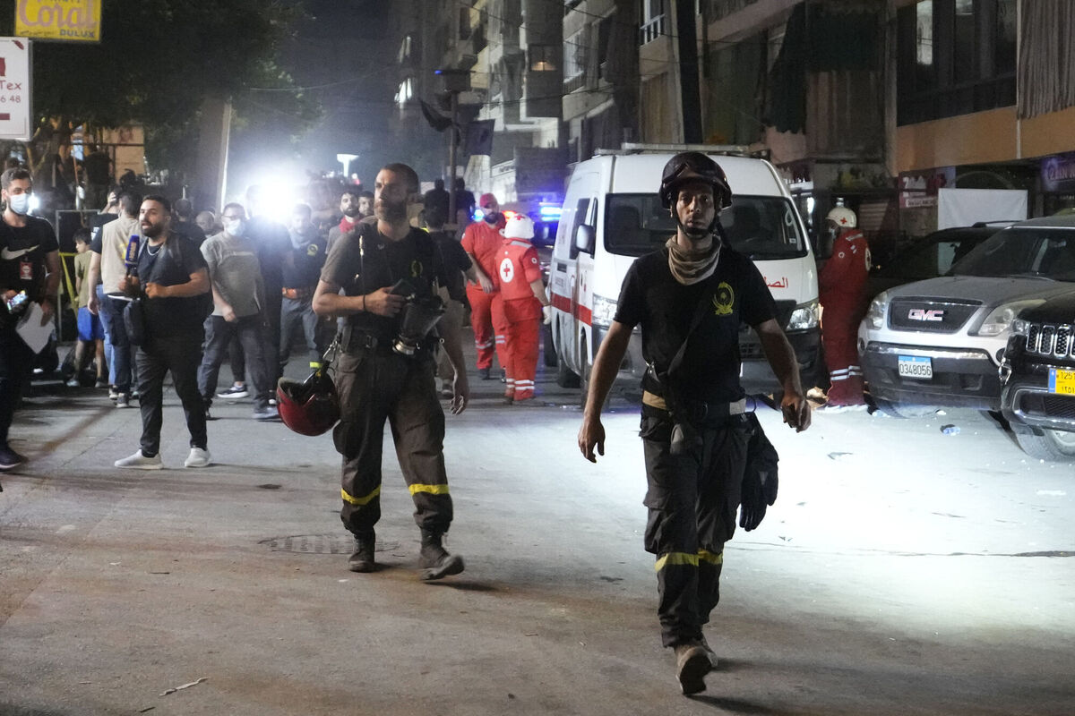 Rescuers work at the scene of an Israeli missile strike in the southern suburbs of Beirut on Friday. Picture: AP Photo/Hassan Ammar