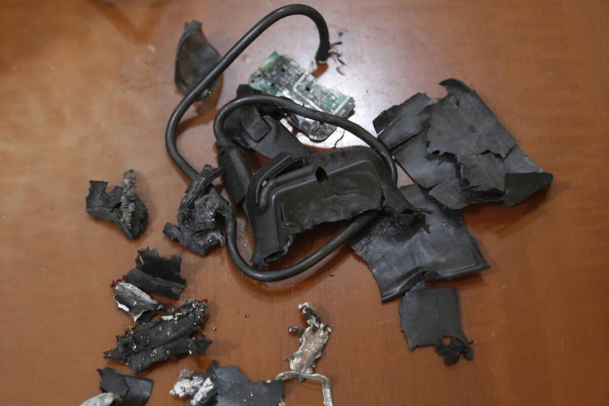 A photo taken on September 18 in Beirut's southern suburbs shows the remains of exploded pagers on display at an undisclosed location. Hundreds of pagers used by Hezbollah members exploded across Lebanon on September 17, killing at least nine people and wounding around 2,800 others. Picture: AFP via Getty Images