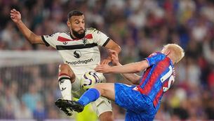 <p>Manchester United's Noussair Mazraoui (left) and Crystal Palace's Will Hughes battle for the ball Pic John Walton/PA Wire. </p>