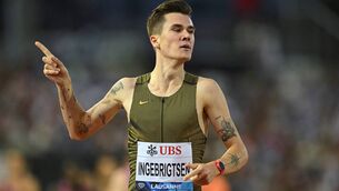 <p>Norway's Jakob Ingebrigtsen celebrates after winning the men's 1500m event in the Diamond League in Lausanne. Pic: Fabrice COFFRINI / AFP</p>