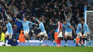 <p>Manchester City's John Stones (centre) celebrates scoring their side's lte equaliser. </p>