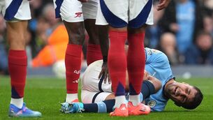 <p>BIG BLOW: Manchester City's Rodri injured during the clash with title rivals Arsenal on Sunday. Martin Rickett/PA Wire.</p>
