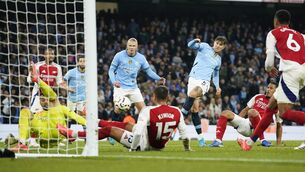 <p>Manchester City's John Stones scores Manchester City's late equaliser against Arsenal. Picture: AP Photo/Dave Thompson</p>