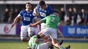 <p>TOUGH TACKLE: St Mary's College's Andrew Sparrow is tackled by Gonzaga College's Luke McLaughlin. Pic: Daire Brennan/Sportsfile</p>