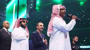 <p>LETS GET READY TO RUMBLE: Turki Alalshikh looks on as the national anthem of Saudi Arabia is sung prior to during the IBF World Heavyweight Title fight. Pic: Richard Pelham/Getty Images.</p>