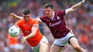 <p>KINGS OF JULY: Oisin Conaty of Armagh is tackled by Cein Darcy of Galway during this year's All-Ireland SFC final. Photo by Ray McManus/Sportsfile</p>