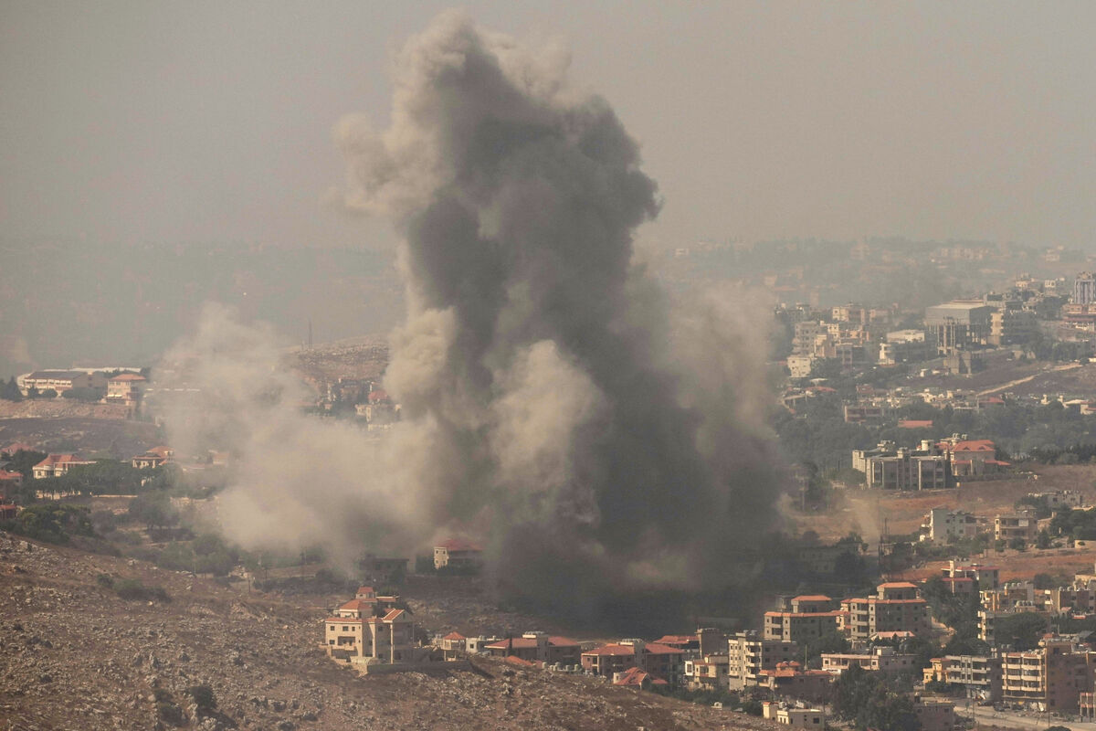 Smoke rises from Israeli airstrikes in the southern village of Kfar Rouman, seen from Marjayoun, south Lebanon. Picture: AP Photo/Hussein Malla)