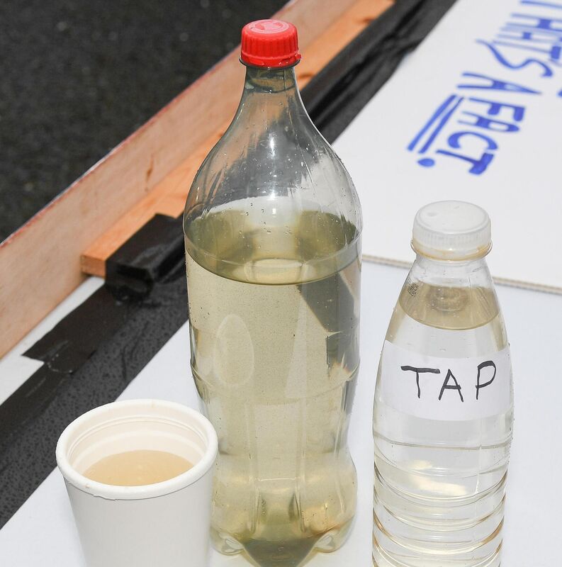  Water samples supplied by residents meeting to raise the issue of water quality at Mount Farran in Cork. Picture: David Keane 