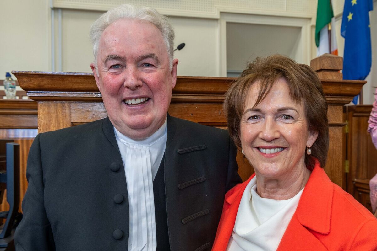 James McNulty with his wife Betty in the packed Clonakilty Courthouse on Friday, his final day as a District Court Judge. Picture: Andy Gibson
