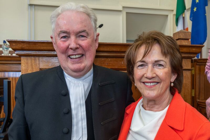 James McNulty with his wife Betty in the packed Clonakilty Courthouse on Friday, his final day as a District Court Judge. Picture: Andy Gibson