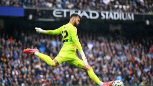 <p>KNOCK IT: Arsenal's David Raya goes long against Manchester City. Photo by Michael Regan/Getty Images</p>