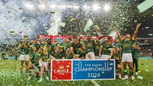<p>NO ORDINARY SQUAD: Siya Kolisi of South Africa lifts the Rugby Championship trophy after defeating Argentina. Pic: Dirk Kotze/Gallo Images/Getty Images</p>