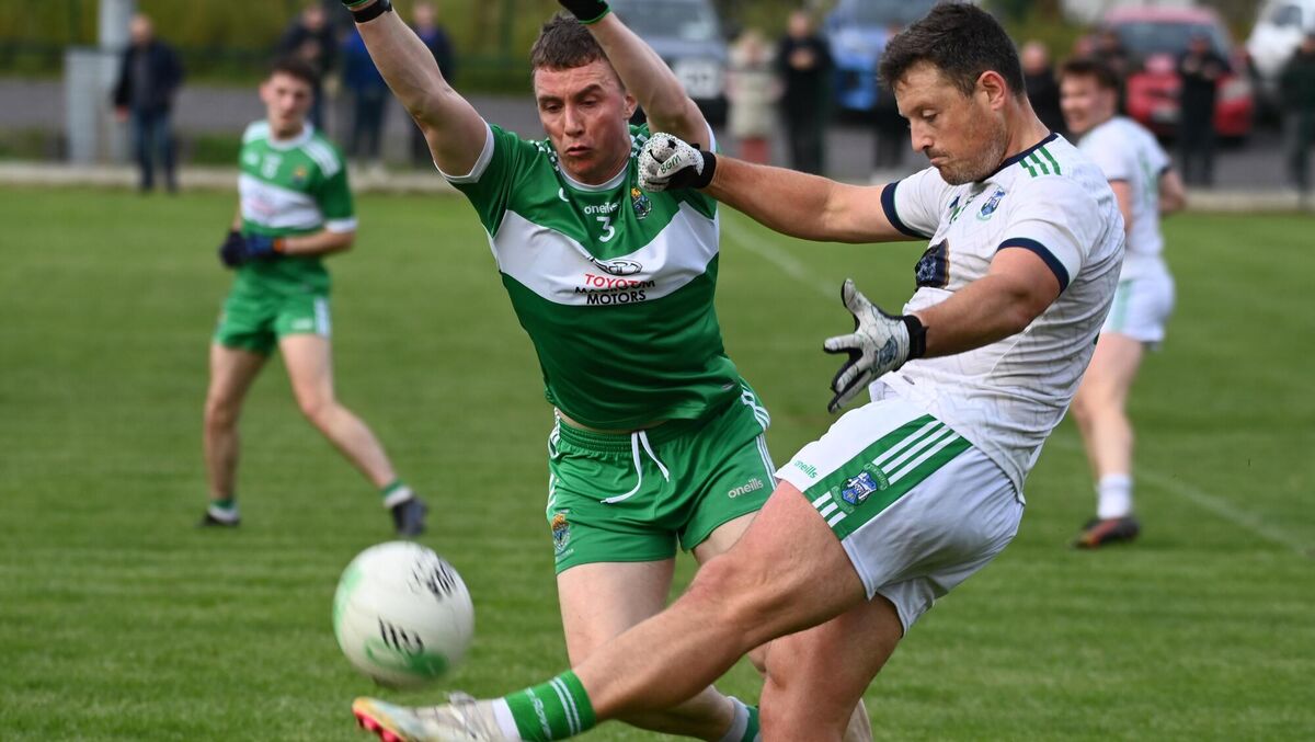 Ilen Rovers' Dan McEoin shoots from Macroom's Rory Buckley during the Cork Premier IFC relegation/playoff at Dunmanway. 