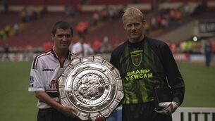 <p>Roy Keane (left) and Peter Schmeichel of Manchester United hold the FA Charity Shield after victory against Chelsea at Wembley Stadium. Pic Graham Chadwick /Allsport</p>