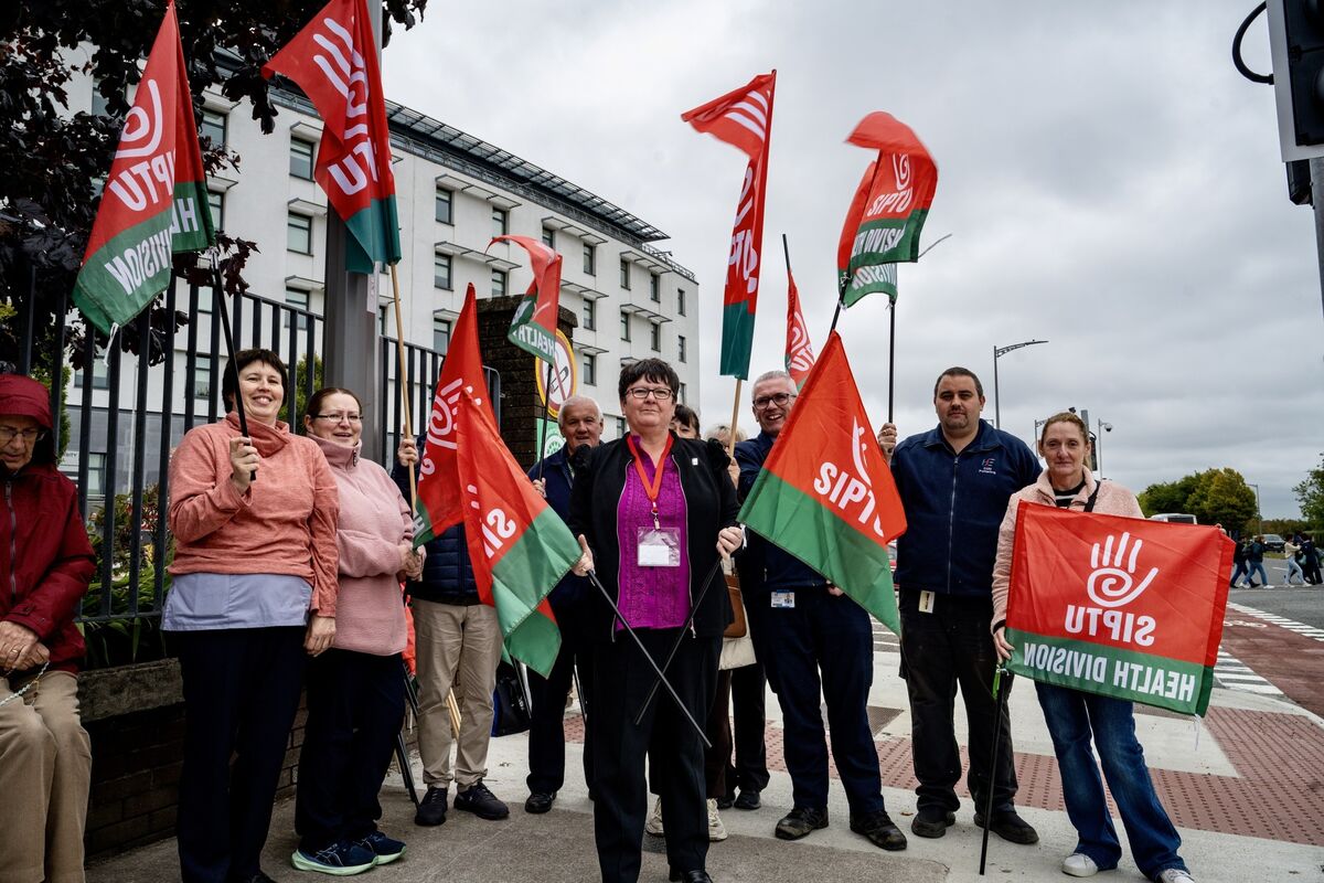 Sharon Cregan and fellow Siptu members protest outside CUH. Picture: Chani Anderson
