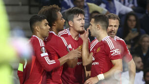 <p>Manchester United's Harry Maguire, center, celebrates after scoring a late equaliser. Pic: AP Photo/Luis Vieira</p>
