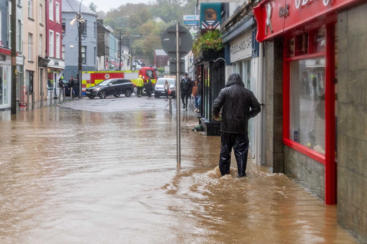 Council workers and the fire service were out in force trying to stem the flood waters in Bantry. Picture: Andy Gibson.