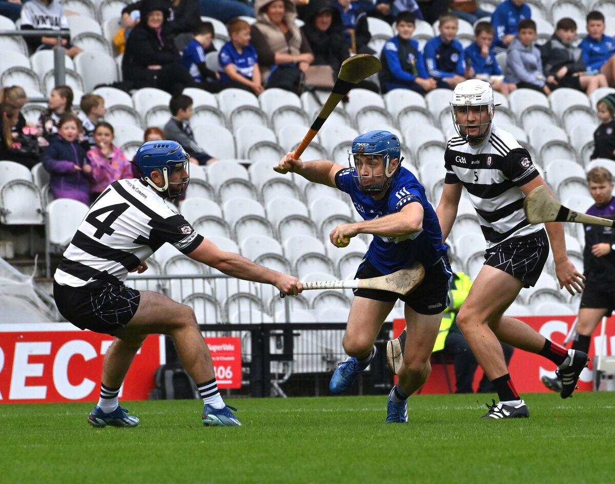 TIGHT AFFAIR: Midleton players Patrick White and Sam Quirke looking to stop Conor O'Sullivan, Sarsfields in their Co-Op Superstores Premier SHC match at SuperValu Páirc Uí Chaoimh, Cork. Pic: Dan Linehan