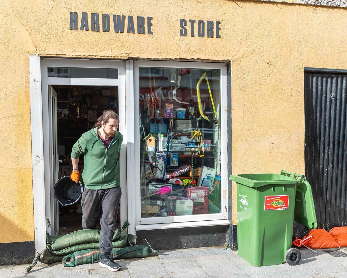 Ian Hurley of Vickery Hardware store cleaning up the damage. Picture: Andy GIbson. Ian Hurley of Vickery Hardware store cleaning up the damage. Picture: Andy GIbson.