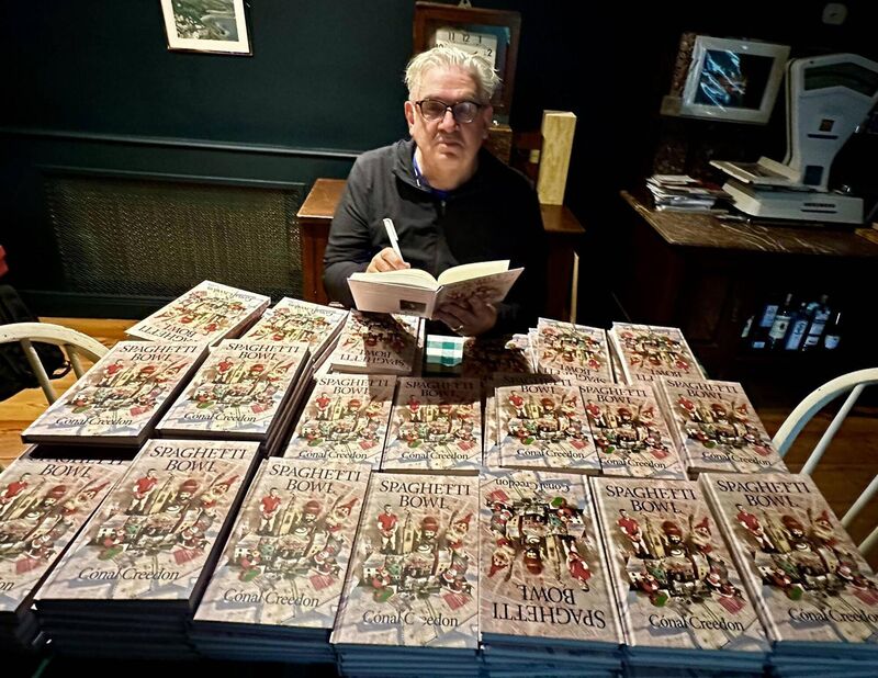 Cónal Creedon signing copies of Spaghetti Bowl. Cónal Creedon signing copies of Spaghetti Bowl.