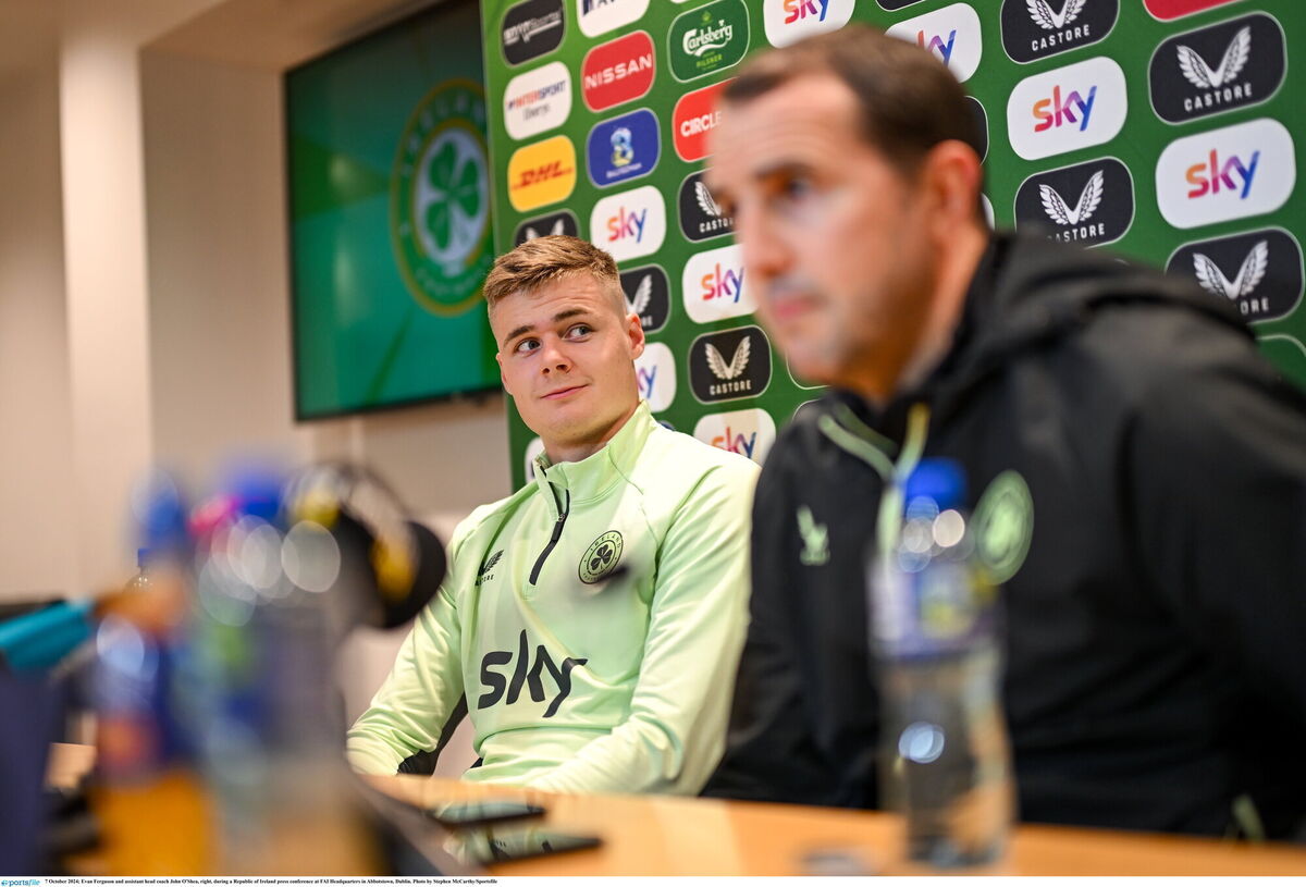 MENTOR: Evan Ferguson and Ireland assistant coach John O'Shea. Photo by Stephen McCarthy/Sportsfile