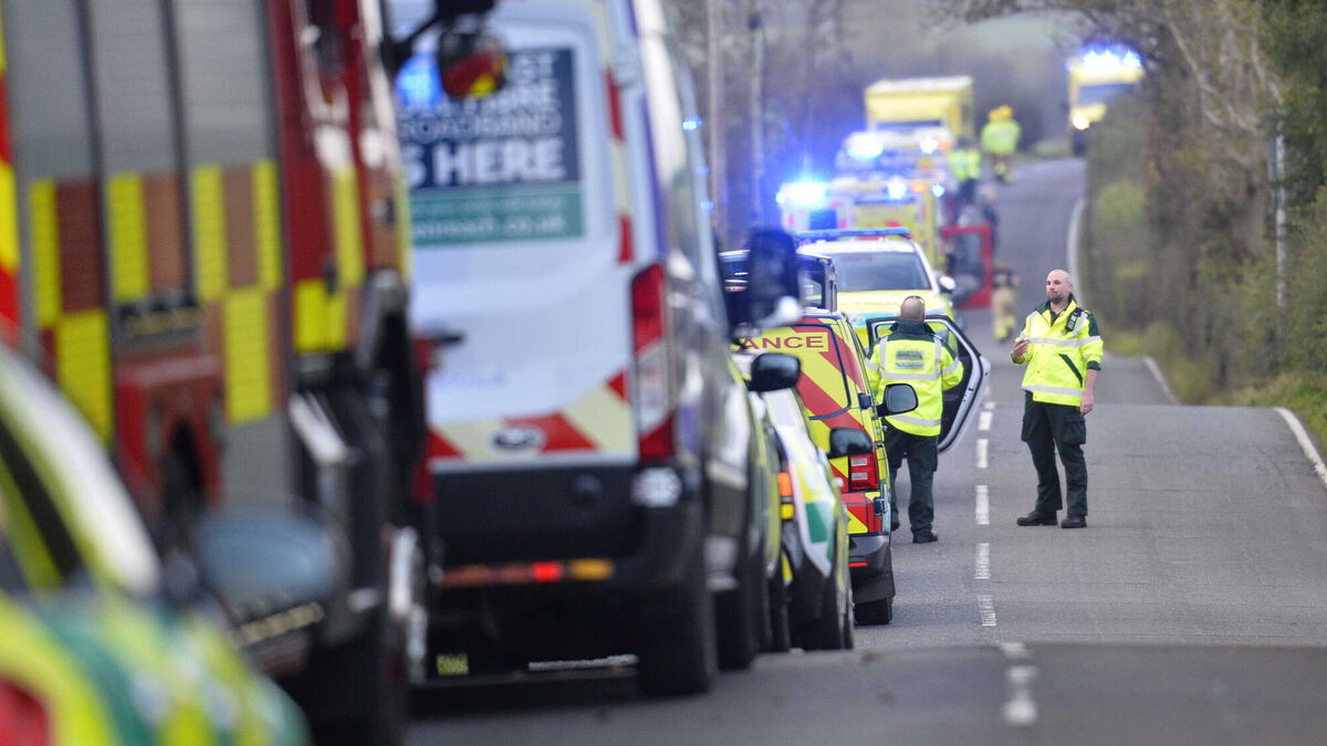 Emergency workers at the scene of a school bus crash on the Ballyblack Road East near Carrowdore in Northern Ireland on Monday afternoon. Picture: Mark Marlow /PA Wire