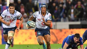 <p>SABBATICAL: Kurt-Lee Arendse of the Bulls (C) runs with the ball. Pic: RODGER BOSCH/AFP via Getty Images</p>