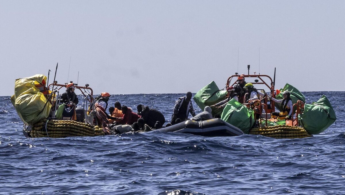 Migrants are helped evacuate a partially deflated rubber dinghy by the rescue personnel of the SOS Mediterranee humanitarian ship Ocean Viking in the Mediterranean in March 2024. Photo: Johanna de Tessieres/SOS Mediterranee via AP Migrants are helped evacuate a partially deflated rubber dinghy by the rescue personnel of the SOS Mediterranee humanitarian ship Ocean Viking in the Mediterranean in March 2024. Photo: Johanna de Tessieres/SOS Mediterranee via AP