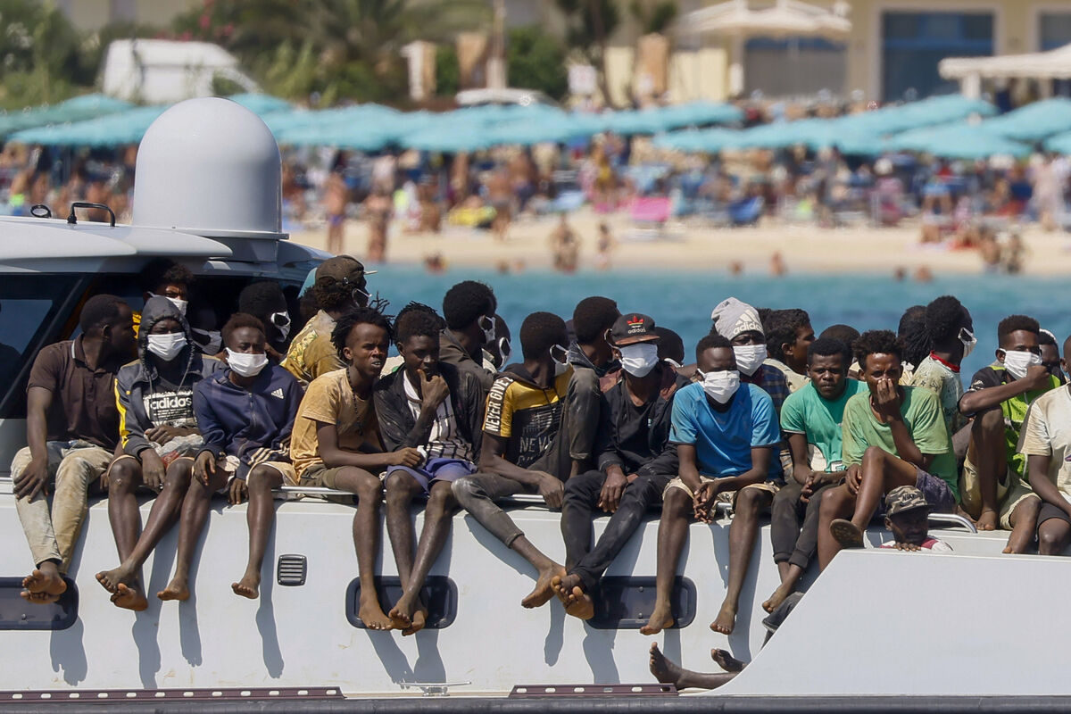 Migrants sit on the deck an Italian Coast Guard vessel as they are taken to the Lampedusa Island after being rescued at sea in September 2023. Photo: Cecilia Fabiano/LaPresse via AP Migrants sit on the deck an Italian Coast Guard vessel as they are taken to the Lampedusa Island after being rescued at sea in September 2023. Photo: Cecilia Fabiano/LaPresse via AP