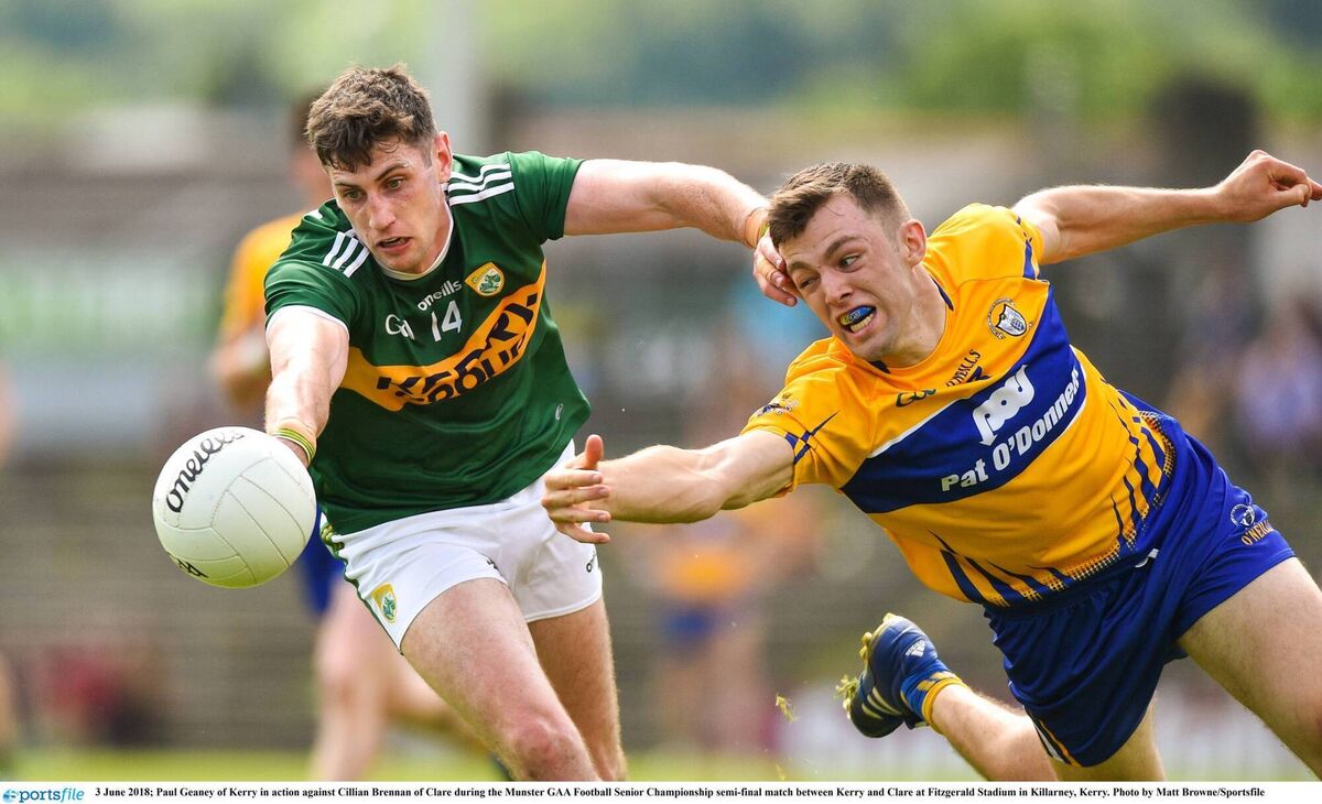 Paul Geaney of Kerry in action against Cillian Brennan of Clare during the 2018 Munster GAA Football Senior Championship semi-final Paul Geaney of Kerry in action against Cillian Brennan of Clare during the 2018 Munster GAA Football Senior Championship semi-final