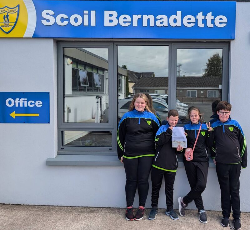 Scoil Bernadette pupils with the cheque and letter from their anonymous donor Scoil Bernadette pupils with the cheque and letter from their anonymous donor