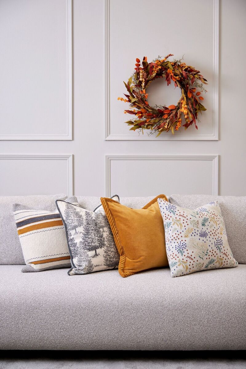  Meadows &amp; Byrne’s cushion selection mixes greys and blues with autumn-themed ochre.