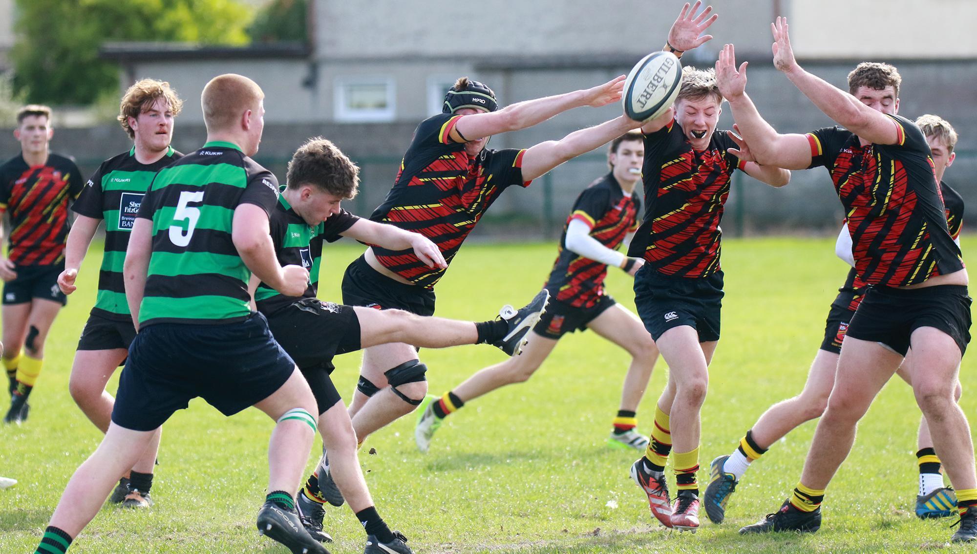 CLEARING THE LINES: Scott Fuller of Bandon Grammar clears the ball away against Ardscoil Ris in the Munster Schools Senior Cup Group B clash at Fitzgerald Park. Picture: Brendan Gleeson