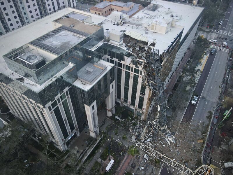 Damage from a fallen construction crane at a building housing the 'Tampa Bay Times'. Picture: Tampa Bay Times/AP Damage from a fallen construction crane at a building housing the 'Tampa Bay Times'. Picture: Tampa Bay Times/AP