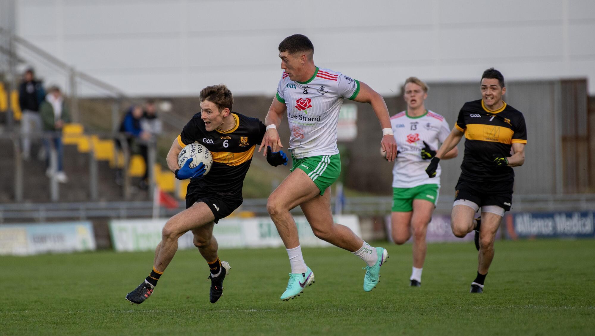  FINAL-BOUND: Dr Crokes' Gavin White bursts past his Kerry colleague Joe O'Connor (St Brendan's) during Saturday's Kerry SFC semi final in Tralee. Pic: Domnick Walsh © Eye Focus LTD .