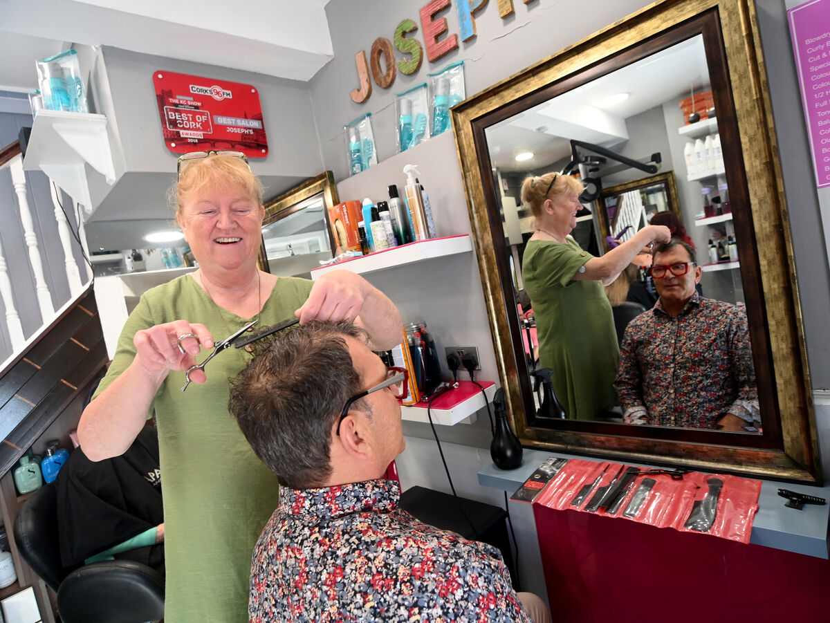 Caitriona Twomey of Cork Penny Dinners giving Joe a chance to relax in the chair for a change. Picture: Larry Cummins Caitriona Twomey of Cork Penny Dinners giving Joe a chance to relax in the chair for a change. Picture: Larry Cummins
