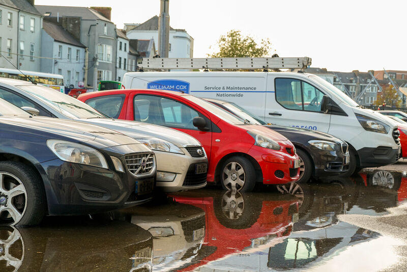 Cars parked among the rising high tide at Morrissons Island, Cork. Picture: Noel Sweeney