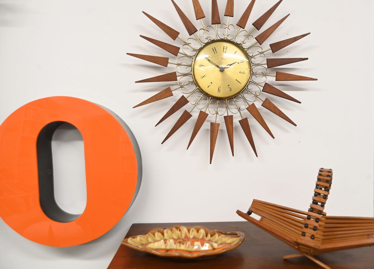 Sunburst wall clock with teak wood at RetroFern Vintage, Midcentury and Retro Interiors at Quay Co-op.