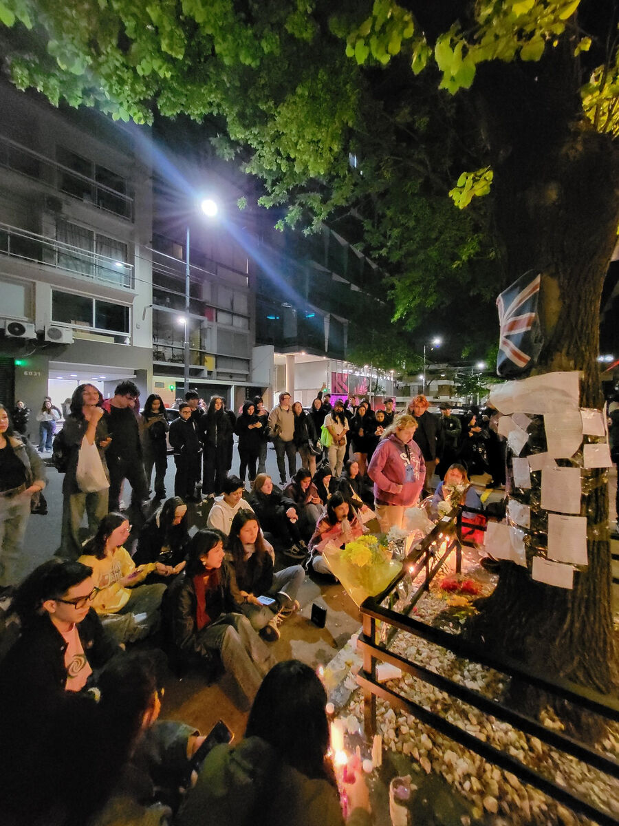 Fans holding a vigil for Liam Payne on Wednesday evening outside the Casa Sur Hotel in the Palermo neighbourhood of Buenos Aires, Argentina. Picture: Valentina Gonzalez Sandoval/PA Wire