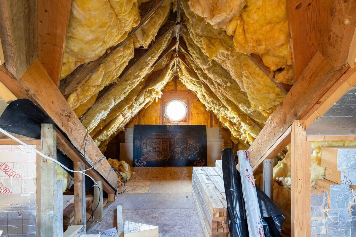 Insulate attic with feature porthole window